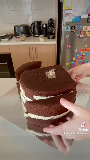 6.1K views · 58 reactions | Making A Heart Shaped Cake 懶 I baked 10inch chocolate Mudcakes for this one, coated in white fondant and white buttercream piping. This is an old video I have re-edited to demonstrate how to shape a circle to a heart cake. Any questions please drop in the comments below 殺 #cakedecorating #cake #foryoupage #teachingtips #caketips #foryoupagereels | Stacey Bakes Cakes | Facebook