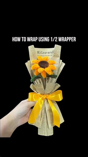 How to Wrap using 1/2 Wrapper. Small Sunflower Bouquet. See pinned comment for the tutorial video. #fyp #foryou #bouquet #bouquets #howtowrap #fuzzywireflower #fuzzywirebouquet #fuzzywirebouquet #fuzzywireflowerbouquet #bouquettutorial #crafter #DIY #tutorial #crafts #SunflowerBouquet #sunflower #wrappingtutorialforbeginners #wrappingtutorial #wrappingtutorials #satinflowerbouquet #bouquetwrappingtutorial #crafters #craftersgonnacraft #diy #craftersofinstagram #craftersoffacebook | Wear Thaleia