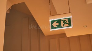Exit Sign Guiding To Safety in a Building Stock Video - Video of left, procedures: 416380707