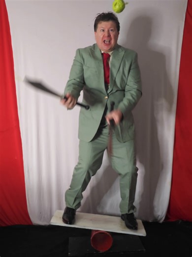 Balancing Businessman Bites Granny Smith Apple Juggling Knives #apple #bite #juggling #balance