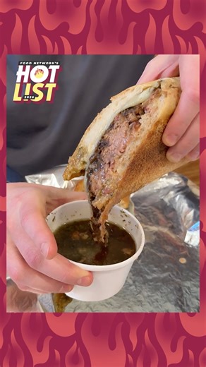 THIS is how the viral French Dip sandwich is made at Salt Hank's in New York City 🤤 It’s piled high with almost half a pound of meat and caramelized onions, then dunked in au jus you could drink! #FNHotList #FoodNetworkFinds | Food Network