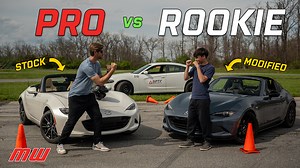 MotorWeek's Overdrive is BACK! This time, Greg Carloss has a friendly competition on the autocross course against 18-year-old aspiring racing driver Dylan Adeli. Greg is rocking a pretty stock Miata while Dylan's Miata is pretty modified and ready for a track day. Plus, there's a few more surprises in store... #MWOverdrive Who will win? FIND OUT NOW! | MotorWeek
