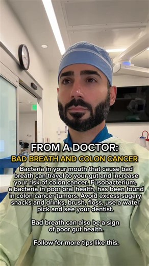 Dr. Joseph Salhab on Instagram: "Bad breath might be more than just embarrassing—it could be a warning sign. Fusobacterium nucleatum is a bacteria that lives in your mouth, especially in plaque and infected gums. Scientists have discovered this same bacteria in colon cancer tumors, and it’s not just hanging out there by accident. Research shows that F. nucleatum can actually travel from your mouth to your intestines, where it helps cancer cells grow and spread. Studies found way more of this bac