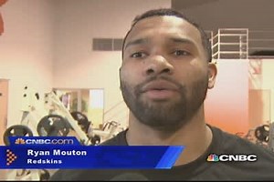 Football players react to Sam