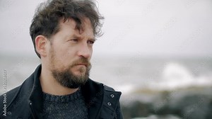 Sad man almost crying hugging and holding woman he loves medium shot