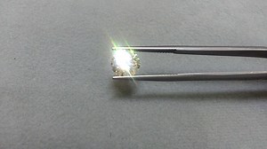 The GIA Colourless grading scale runs from D to Z. Different people are drawn to different colours along the scale, and as you travel down the alphabet, the diamond becomes less expensive. This diamond was chosen in order to achieve huge size on the finger. This is a GIA graded 2.55ct, M colour, VVS2 clarity, Hearts & Arrows cut diamond. When set into Yellow or Rose 18kt Gold, the colour is lightened, giving a warm and sparkly look at about 2/3 of the cost of a D-H colour diamond of the same siz