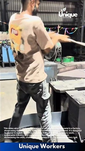 Moving hot metal: people moving hot metal in a factory