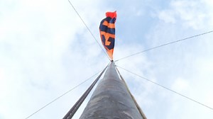 Orange Flag flies from the highest building in Syracuse