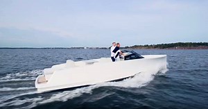 Q Yachts introduces rapper to quiet, emissions-free luxury boating