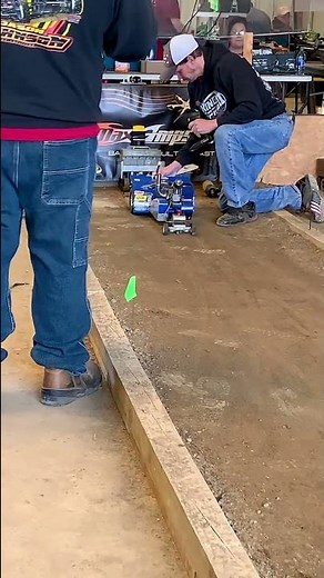 Modified RC tractor pulling with a lot of weight on the sled