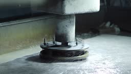 Grinding porcelain tiles with a special nozzle on the machine....