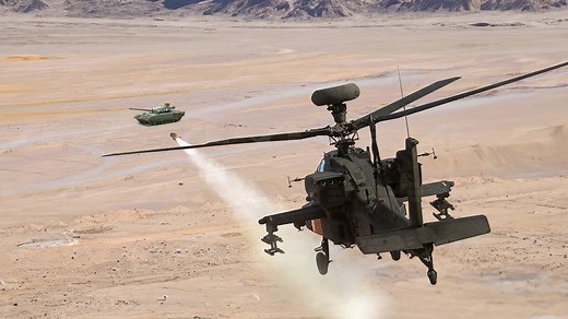US AH-64 Apache Destroys Tanks with Powerful Missiles in Desert
