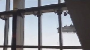 High winds, 91 stories up, platform taken for a perilous spin, crew survives with bruises | CBC News