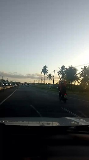 Scenic Sunset Drive: Highway Perspective from a Vehicle