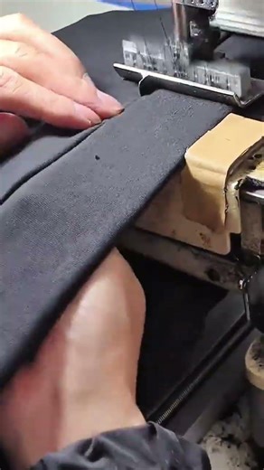 Sewing parallel lines on dark elastic fabric using a multi-needle industrial machine