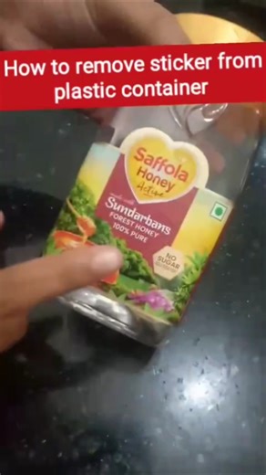 How to remove sticker from plastic container #kitchenhacks #kitchencleaninghacks #kitchentimesaving