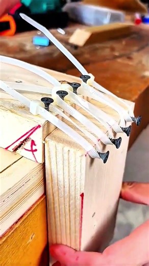 Zip ties loop screws pull wood pressed tight