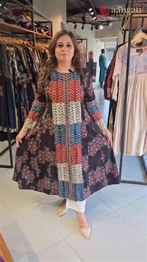 Aanganofkutch on Instagram: "Black Ajrakh Kurta ✨ This black Ajrakh kurta comes with multicolour panelling and delicate mirror detailing that adds just the right touch of charm. Crafted in a super soft, comfortable fabric, it’s easy to carry all day. Designed with two functional pockets—perfect for your mobile and wallet. Available in one more colour. Price: ₹3199 Sizes: M, L, XL, XXL, 3XL 📩 To order: Screenshot and DM us 🛍️ Also available at our stores in Ahmedabad, Vadodara, Surat & Bhuj ⚠️ 