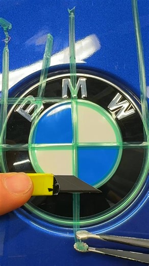 M Power Emblem Custom Cut: BMW 330 Badge Weapon 🔵🔴😈 Custom-cut vinyl builds an M Power–style emblem on the BMW 330 with sharp color balance and clean edges. This cut-and-apply process rewards patience and precision. Badges still shout performance. Would you DIY a custom emblem? 👀 #BMW330 #MPowerStyle #CustomEmblem #VinylWrap #AggressiveMods | X Emblem