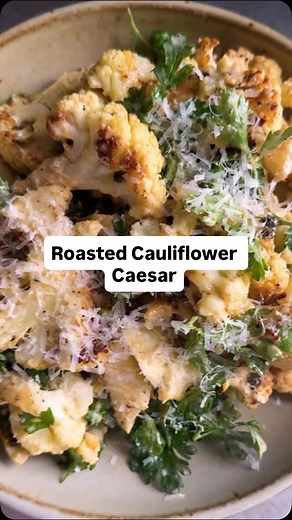 NYT Cooking on Instagram: "Here’s how to make @andybaraghani’s Roasted Cauliflower Caesar: • 1 medium head cauliflower (regular or romanesco), about 2 pounds • ¼ cup capers, drained • ¼ cup extra-virgin olive oil • Salt and freshly ground black pepper • 1 lemon • ½ cup finely grated Parmesan, plus more for topping • ¼ cup mayonnaise • 1 tablespoon Dijon mustard • 2 oil-packed anchovies, drained and finely chopped • 2 garlic cloves, finely grated • 1 cup whole parsley leaves Heat the oven to 450 