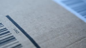 Applying a Label to a Cardboard Box