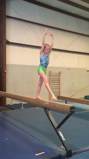 Cross Handstand on Beam