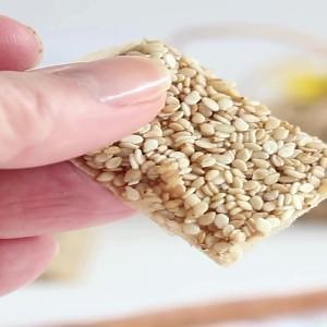 Learn how to make Sugar-Free Sesame Snaps Recipe – a crunchy, homemade treat that combines the goodness of toasted sesame seeds with a medium sweetness using only three ingredients. These snaps are a great favorite snack bar and a delightful and light option for those looking for a tasty treat without added sugar. Full Recipe: https://www.lowcarb-nocarb.com/sugar-free-sesame-brittle-bars/ | Lowcarb-nocarb