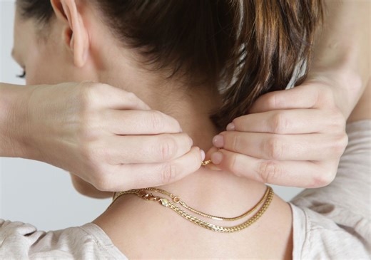 The Old-School Trick That Keeps Your Necklace From Sliding All Day