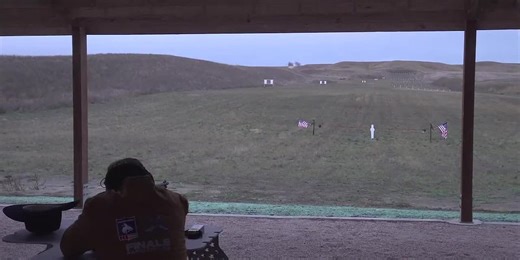 Governor Larry Rhoden shoots ribbon to open new shooting complex