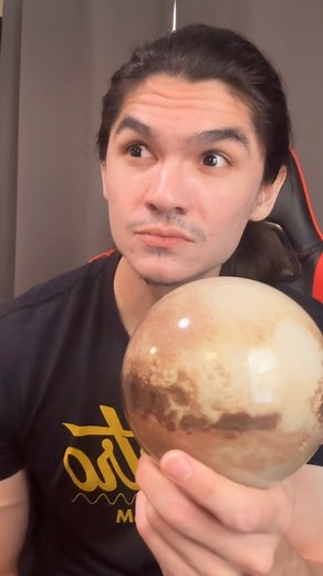 Evan Guerrero on Instagram: "Pluto may not be a planet, but it is the king of the Kuiper Belt! 👑 Check out @movaglobes and use code “EVAN” - link in my bio! #movaglobes #pluto #space"
