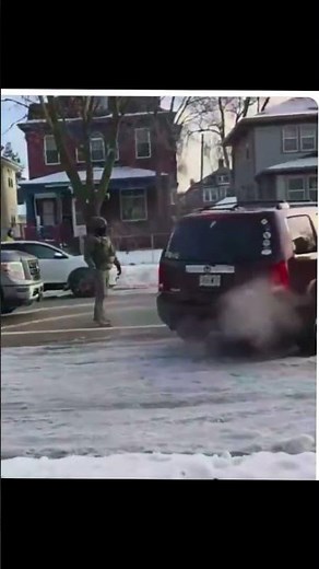 Video shows the moment a woman tried to RUN OVER ICE agents with her vehicle in Minneapolis,