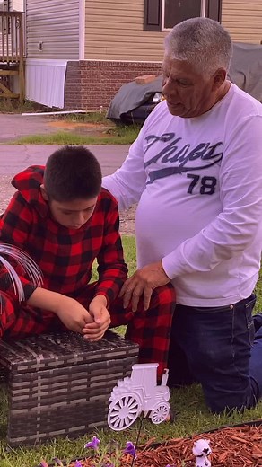 Heartwarming Interaction Between Adult and Child Outdoors