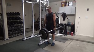 Stabilized Suitcase Deadlifts...this exercise will absolutely HAMMER your core (and the muscles that attach to your spine). It's a one-arm deadlift, done suitcase style, with the bar beside you. Normally, this exercise would be done freestanding, without holding onto anything else. With this stabilized version, you hold onto and simultaneously pull up on the immovable safety rail of a power rack while you're lifting the barbell off the floor. Now, this SOUNDS like it would defeat the purpose of 