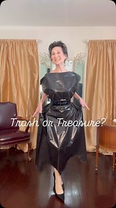 Trash 🗑️ or Treasure 🏴‍☠️? I’m styling a genuine trash bag and a thrifted jumpsuit that looks like one! Don’t be trashin’ when it comes to fashion! #fashion #trash #satire #sustainablefashion #jumpsuit | Positively Cathy