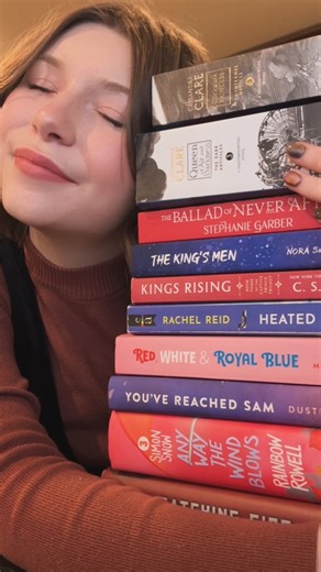 Avery Tussing on Instagram: "Books I’ll never recover from♡ Books mentioned (in order of appearance) Clockwork Princess by Cassandra Clare Queen of Air and Darkness by Cassandra Clare The Ballad of Neverafter by Stephanie Garber The King’s Men by Nora Sakavic Kings Rising by C.S. Pacat Heated Rivalry by Rachel Reid Red, White and Royal Blue by Casey McQuiston You’ve Reached Sam by Dustin Thao Anyway the Wind Blows by Rainbow Rowell Catching Fire by Suzanne Collins Divine Rivals by Rebecca Ross ♡