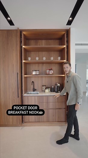 HIDDEN EVERYTHING😱😉. Now that’s how you do a tall wall! Beautiful walnut wood veneer all over bidding your typical stainless steel appliances. Who would choose stainless steel over gorgeous warm walnut😎?!? This tall wall has every kitchen feature you can ask for, let us know what you think we missed? Tag your partner to show them that your tall kitchen wall doesn’t need to be ugly with stainless steel appliances 😉😉 #kitchen #kitchengoals #dreamhouse #interiordesign #interiordesignhacks #des