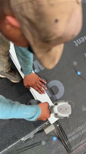 Roofer using a nail gun on drip edge! 😳 #roofing #construction