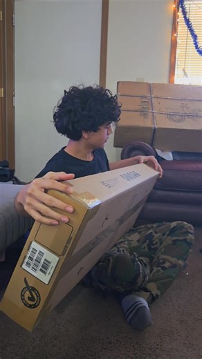 Look at that concentration! 👀 This Christmas, Gio's musical dreams just got a major upgrade! 🎁 He's been so dedicated to playing, even with a broken acoustic, and now he has the electric guitar he's always wanted. So proud of his passion and can't wait to hear all the amazing music he'll create.🌟🎸 #ChristmasPresent #GuitarDreams #FutureMusician #ProudParent #ElectricGuitar #GiftOfMusic #Christmas2025 #UnboxingJoy | Sweet Tino Bebes Journey Familia & Beyond