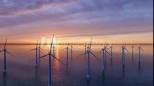 4k Ultra HD 3840x2160. Ocean Wind Farm. Windmill farm in the ocean. Offshore wind turbines in the sea. Wind turbine from aerial view,.