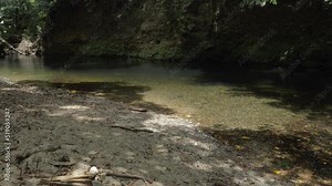 Shallow Stony River In Daintree National Park Near Emmagen Creek Swimming Hole In Cape Tribulation, Queensland, Australia. Close Up
