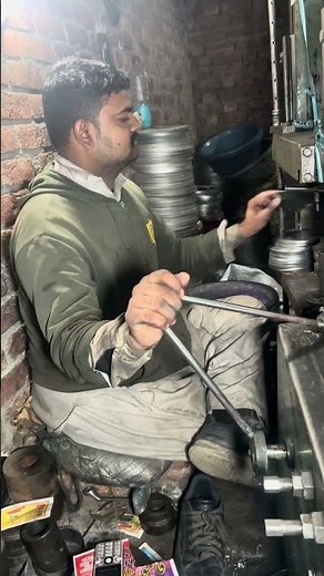 Power pressing machine in action