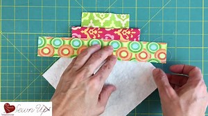 22K views · 704 reactions | There're many ways to quilt-as-you-go. This is one of them. It's also a block to use all those fabric scraps left over from other projects. Follow my blog to get all my videos in your inbox. Ful video: - https://youtu.be/pmLEOgxqfko Blog post: - https://mypatchwork.wordpress.com/2018/03/01/video-tutorial-strip-quilt-as-you-go-qayg-quilt-block | TeresaDownUnder | Facebook