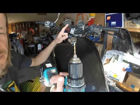 Gas tank cap removal with no key