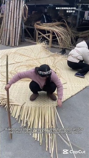Woman Weaving a Bamboo Mat with Expert Skill
