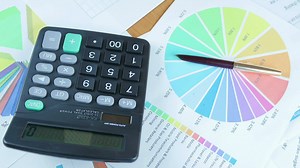 Analyzing diagram and calculating - Free Stock Video