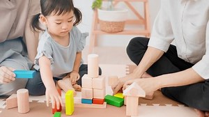 clip-1083299359-girl-playing-building-blocks