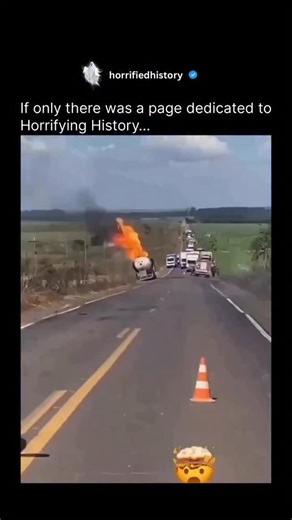 Horrifying History on Instagram: "Video captures raw footage of an LPG tanker overturning and exploding on a rural highway in Bhachau, Gujarat, India, on December 1, 2025, creating a spherical fireball that engulfs five to six nearby vehicles amid traffic cones and emergency responders. - Debris from the blast, including a truck tire, flew up to 500 meters, with the fire’s rapid spread destroying the tanker and adjacent trucks; authorities report potential fatalities, including the driver, thoug