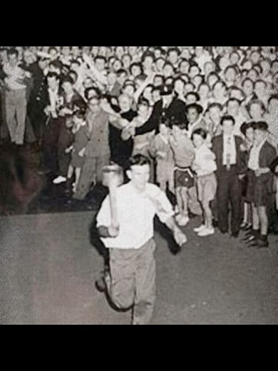 Great Olympic Hoax - The 1956 Olympic Torch was actually... burning underpants? 🩲🔥 Student Barry Larkin fooled 30,000 people and the police with a chair leg and a plum pudding can. He even got a motorcycle escort! By the time the real athlete showed up, the prankster was already on a tram home. 🏃‍♂️💨#olympics #historytime #sydney #1956 #prank #funnyhistory #australia #storytime #barrylarkin #olympictorch