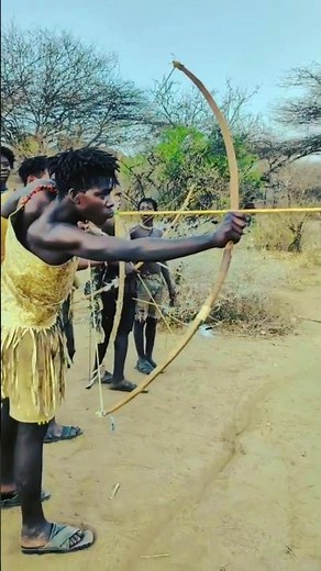 Hadzabe tribe hunters hunting wild boar with bow and arrow | Amazing jungle skills #Shorts #bowhu...
