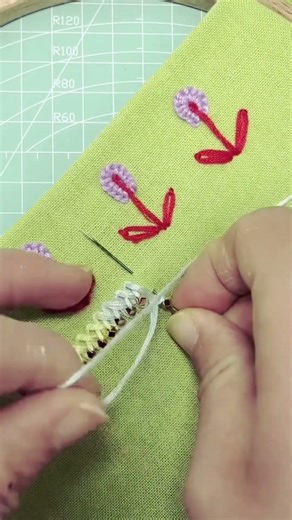 Slide a single gold seed bead onto your needle, then anchor it with a small stitch.